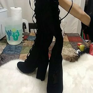 Knee high lace up boots
